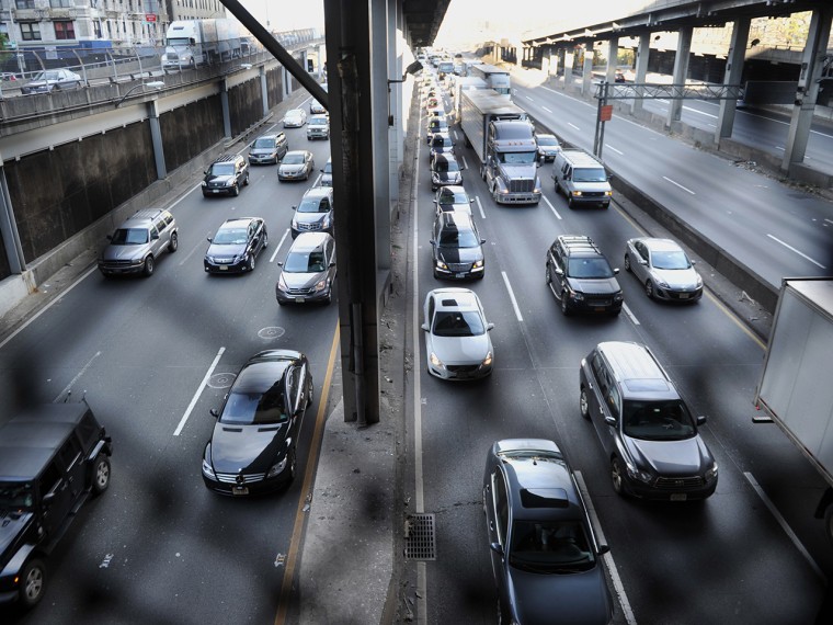 Heavy traffic exits the George Washington Bridge as morning commuters drive into Manhattan.