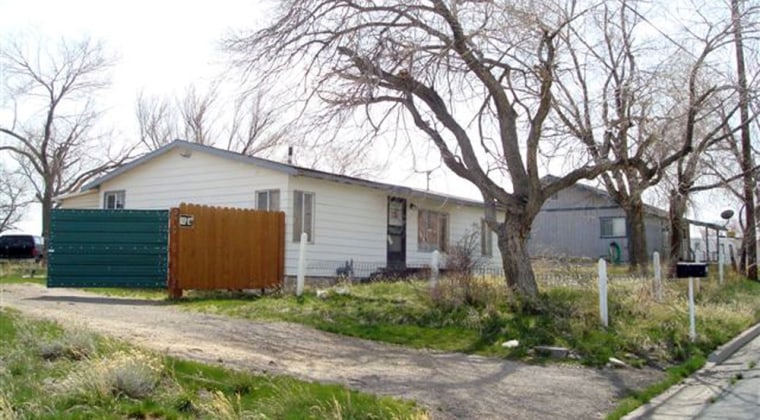 The overgrown front yard of Joseph Naso's home near Reno, Nev. He is accused of the 'alphabet murders'