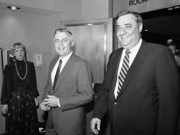 Georgia Democratic Party Chairman Bert Lance, right, walks with Democratic presidential candidate Walter Mondale in Atlanta in this Sept. 7, 1984 file photo.