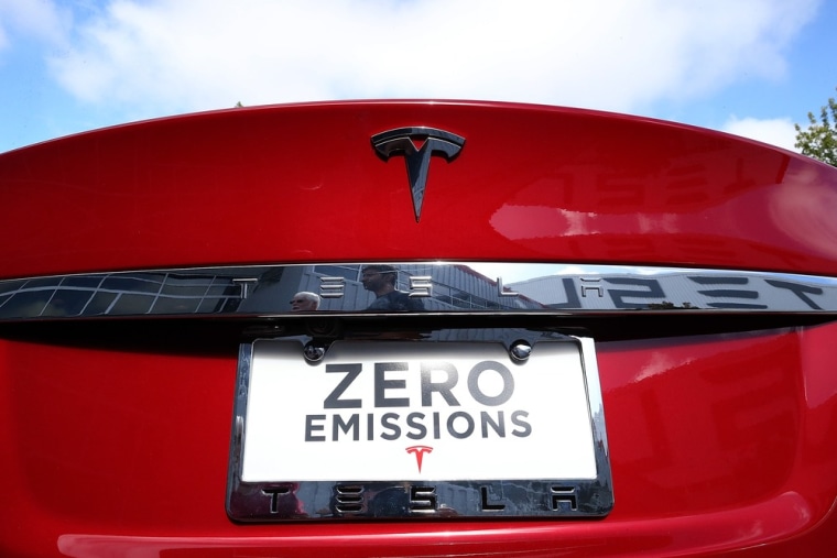 A Tesla Model S sedan is seen parked outside of the Tesla Factory on August 16, 2013 in Fremont, California.