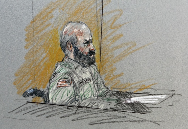 In a courtroom sketch, Maj. Nidal Malik Hasan sits in court for his court-martial in Fort Hood, Texas, on Aug. 6.