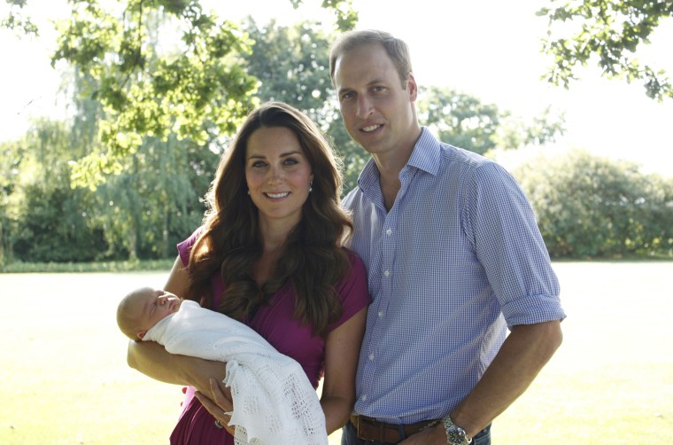 Prince William and Duchess Kate hold their newborn son, Prince George, at Kate's family's Bucklebury estate. The intimate photograph was taken by Kate's father, Michael Middleton.