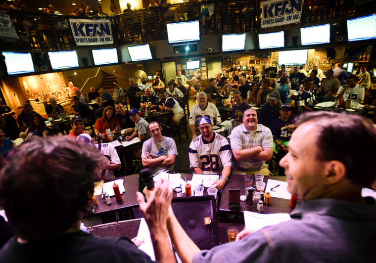 Paul Charchian, local radio host and head of the Fantasy Sports Trade Association, chats with fantasy football fans at the Pourhouse restaurant in Min...