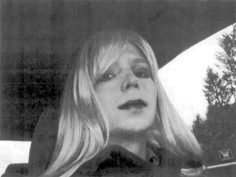 In this undated photo provided by the U.S. Army, Pfc. Bradley Manning poses for a photo wearing a wig and lipstick. Manning emailed his military thera...