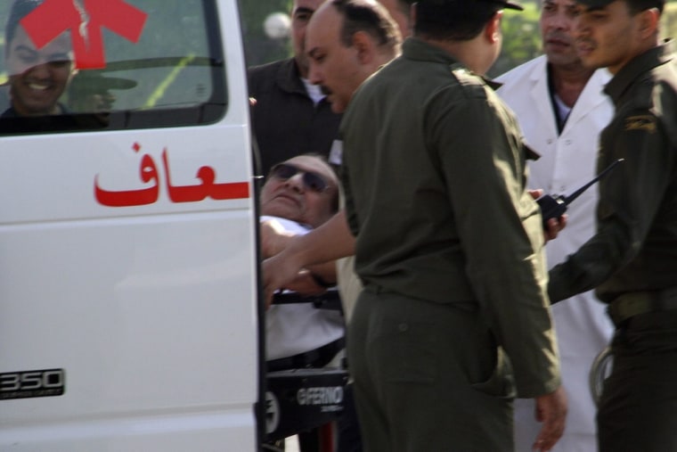 Former Egyptian president Hosni Mubarak arrives at the military hospital in Maadi, Cairo, on Thursday.