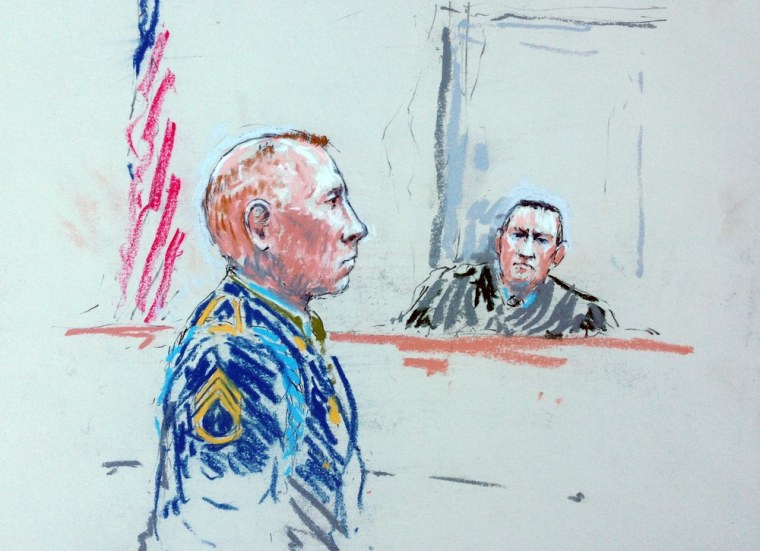 In this courtroom sketch, Staff Sgt. Robert Bales, left, appears before Judge Col. Jeffery Nance in a courtroom at Joint Base Lewis-McChord, Wash. on Aug. 20, during a sentencing hearing.