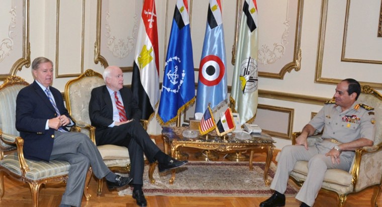 Egyptian Vice Prime Minister and Minister of Defense, General Abdel-Fattah el-Sissi (right) meets U.S. senators John McCain (center) and Lindsey Graham (left) at the defense ministry in Cairo earlier this month.