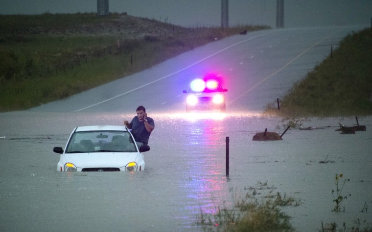 Floodwaters strand motorist in Colorado Springs