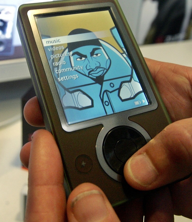 A Microsoft portable Zune media player is shown during a demonstration of the device, Thursday, Sept. 14, 2006, in Redmond, Wash. Microsoft Corp.'s ef...