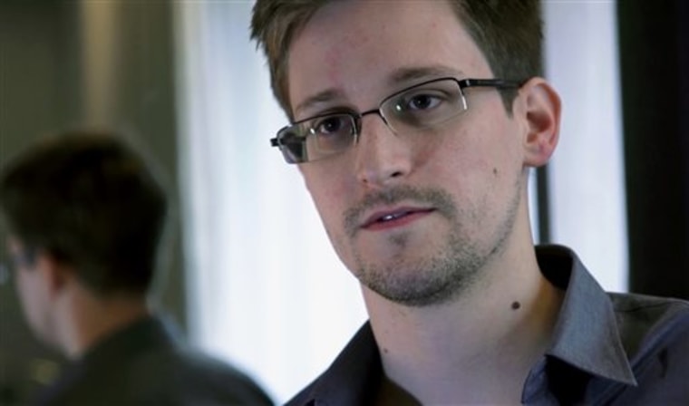 FILE - A Sunday, June 9, 2013, file photo provided by The Guardian newspaper in London shows Edward Snowden, who worked as a contract employee at the ...