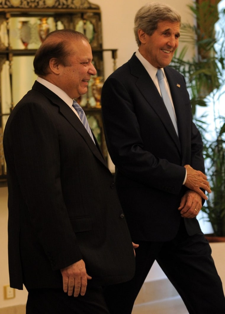 Pakistan's Prime Minister Nawaz Sharif walks with Secretary of State John Kerry during their meeting in Islamabad on Aug. 1.
