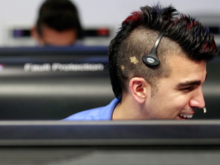 PASADENA, CA - AUGUST 5:  Activity lead Bobak Ferdowsi, works inside the Spaceflight Operations Facility for NASA's Mars Science Laboratory Curiosity ...