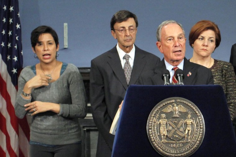 New York Mayor Michael Bloomberg (3rd L) speaks to the media during a news conference about Updates to New Yorkers on Preparations for Hurricane Sandy...