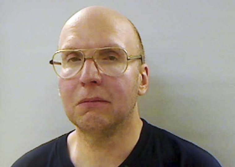 Knight in an April booking photo.