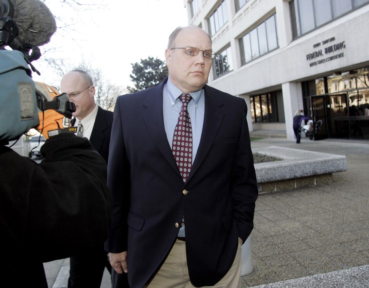 In this February 2010 picture, Master Sgt. Timothy Hennis leaves the Terry Sanford Federal Building and Courthouse after a federal hearing in Raleigh, N.C.