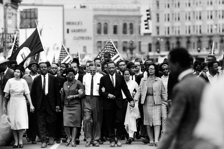 The Rev. Ralph Abernathy, Ralph Bunche, Martin Luther King Jr., Mrs. King, and Rosa Parks during the Selma March, 1965.