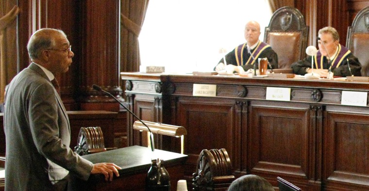Nolan Atkinson Jr., left, George B. Vashon's great grandson and a lawyer from Philadelphia, addresses the Pennsylvania Supreme Court during the ceremony where the court awarded a posthumous Certificate of Admission to practice law to the descendants of Vashon in Pittsburgh, on Oct. 20, 2010.