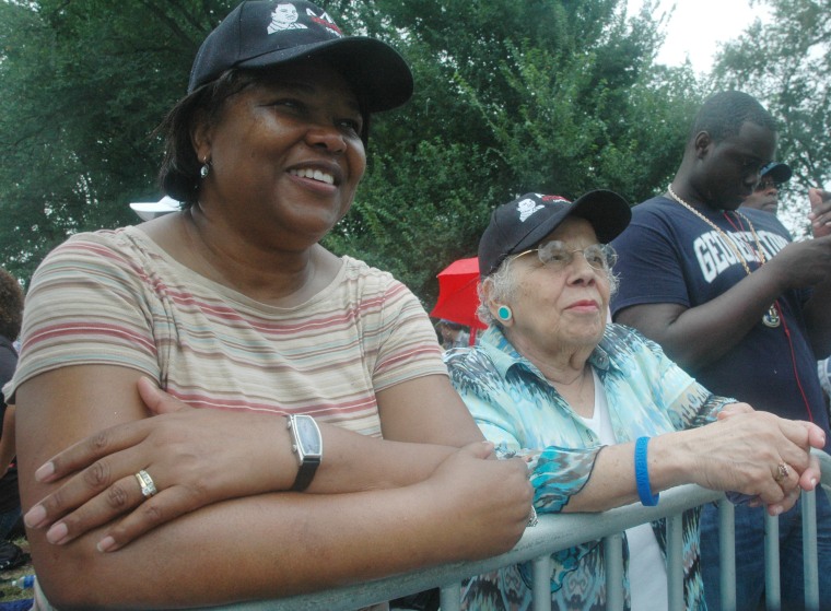Imogen Hutchinson, 60, left, with her friend, Reba Diggs, 81, at the 50th anniversary of Martin Luther King's
