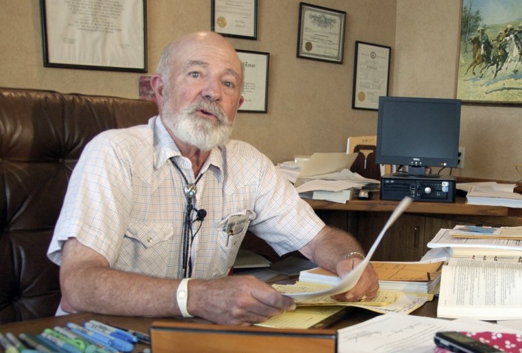 Judge G. Todd Baugh reads a statement Wednesday in Billings, Mont., apologizing for saying a 14-year-old sexual abuse victim was 'older than her chronological age' and was 'in control' of the situation.