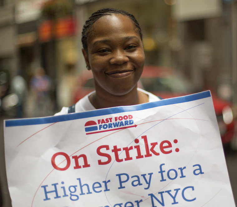 \"You're trying to go up and you're just going down,\" said protester Shantel Walker, 31, of Brooklyn who makes $7.25 working at a Papa John's in Manhat...