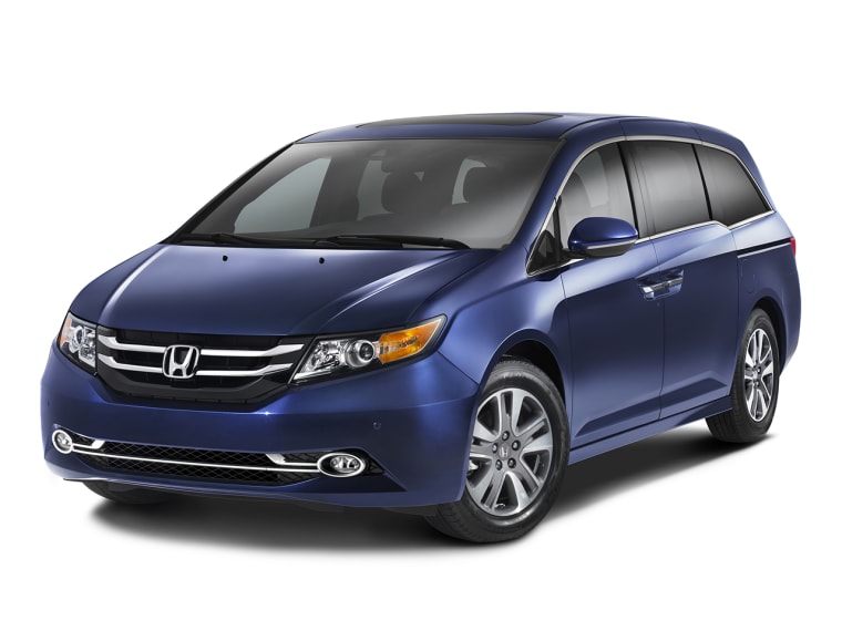This product image provided by Honda Motor Co. shows the 2014 Honda Odyssey Touring Elite. Honda Motor Co. showed off its updated Odyssey minivan Tues...