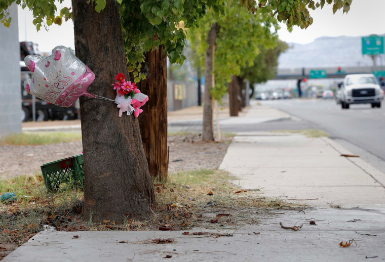 A makeshift memorial in Phoenix for a 6-year-old girl killed in a car crash. Her 8-year-old brother was driving their mother's car on a nighttime joyride when it crashed into a telephone pole.