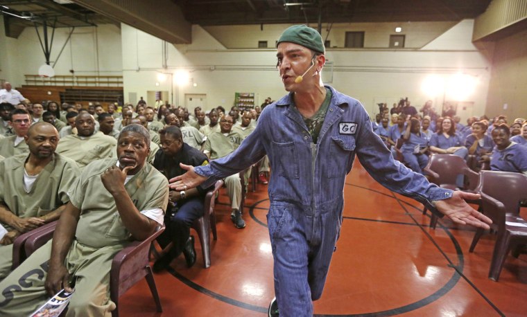 Rapper GQ, aka Gregory Qaiyum, performs during a hip hop adaptation of William Shakespeare's Othello, titled