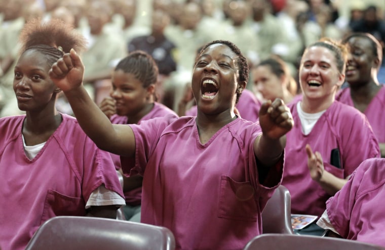 Inmate Kristy Montgomery cheers from her seat.