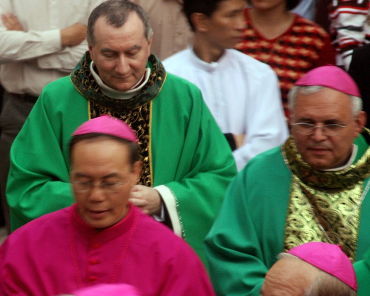 Vatican's Undersecretary of State Pietro Parolin (left, rear) is seen marching behind Hanoi's Archbishop Ngo Quang Kiet in this 2009 file photo.