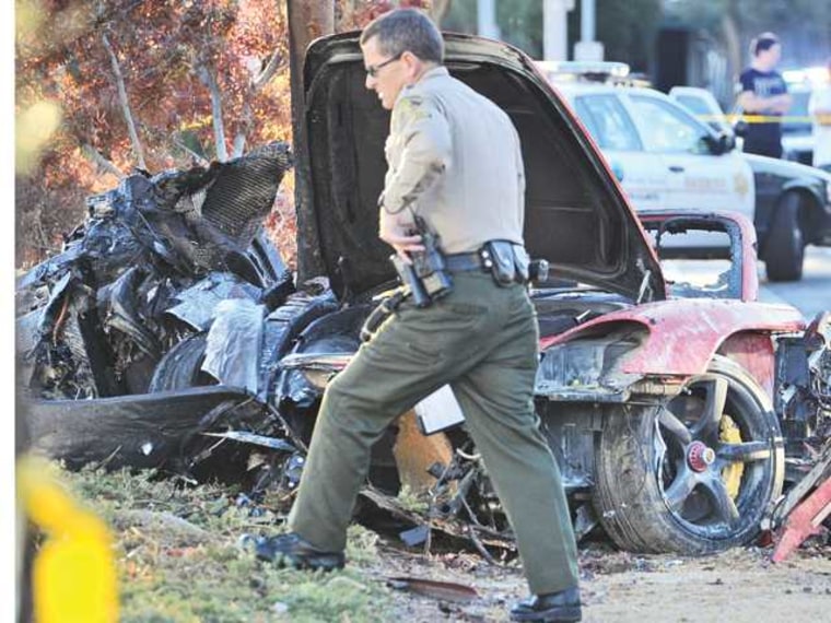 Image: Police officer at scene of crash which killed actor Paul Walker