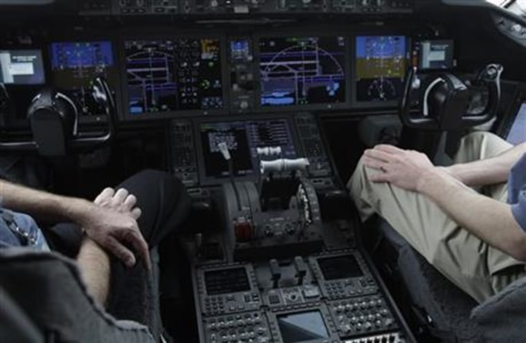 In this Feb. 3, 2011, photo, the cockpit of a Boeing 787 Dreamliner is photographed in Houston. Automation has been a tremendous safety boon to aviation, but pilots are increasingly reliant on the computer systems.
