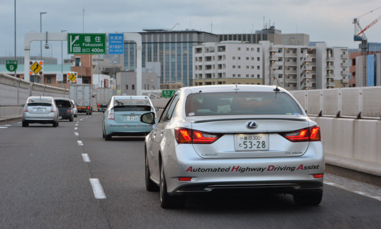 This photo taken on October 10, 2013 shows Japanese auto giant Toyota Motor demonstrating the advanced driving support system