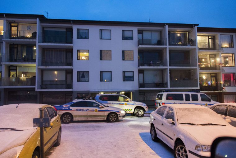 Officers outside a house where a man was shot dead by police in Reykjavik on Tuesday.