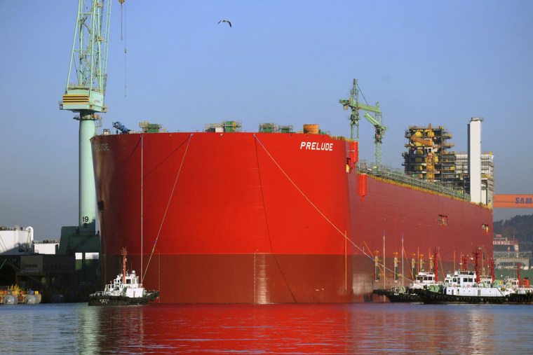 Handout photo of a 488 metre long hull of Shell's Prelude floating liquefied natural gas (FLNG) plant that has been floated out of the dry dock at the...
