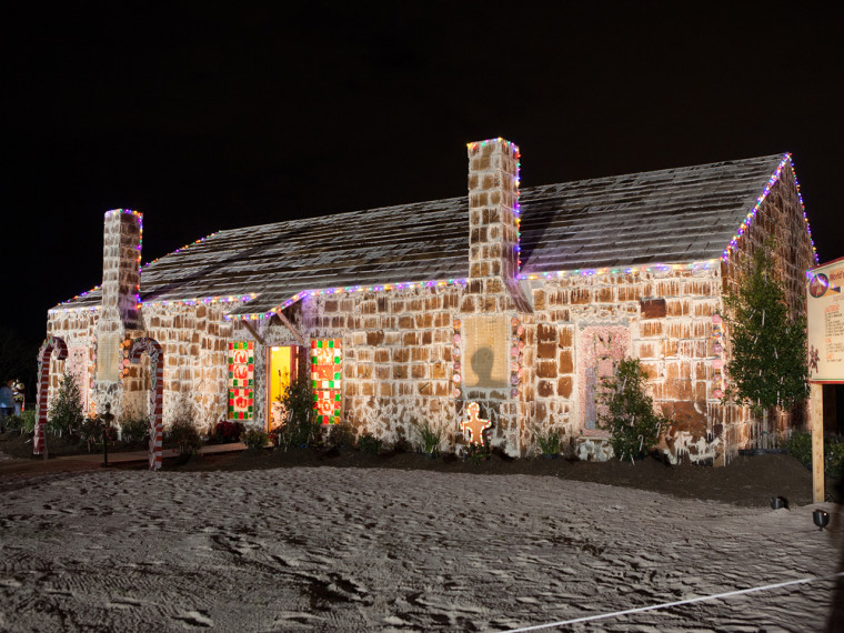 It took 1,800 pounds of butter, 7,200 eggs, 7,200 pounds of flour and close to 3,000 pounds of brown sugar, plus 22,304 pieces of candy, to create the outside of the gingerbread house.