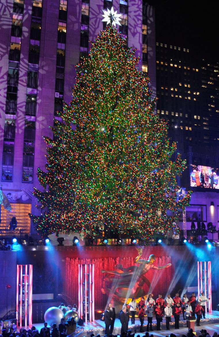 The Christmas Tree is lit during 81st Annual Rockefeller Center Christmas Tree Lighting Ceremony at Rockefeller Center on...