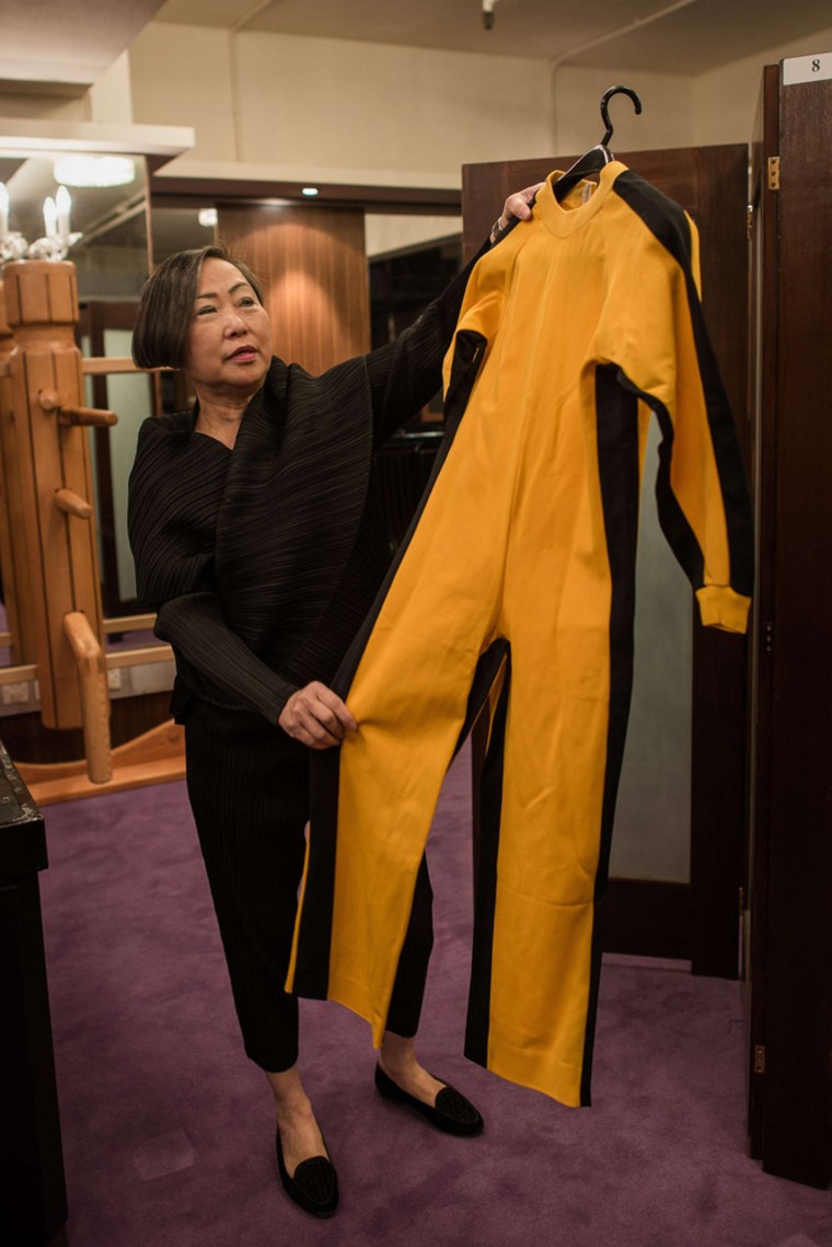 Spink auction house vice chairman Anna Lee briefs the press on a jumpsuit worn by Bruce Lee during the filming of 'Game of Death' in 1972 during a preview of the Bruce Lee 40th anniversary collection auction in Hong Kong on Dec. 2. A collection of personal articles from the life and career of Lee, who died from swelling of the brain aged just 32, is to go on sale in the former British colony on Dec. 5, in coincidence with the 40th anniversary of his death.