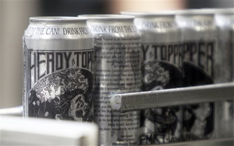 Cans of Heady Topper roll off the line at the Alchemist Cannery in Waterbury, Vt. The beer is so popular, it's sometimes sold illegally online.