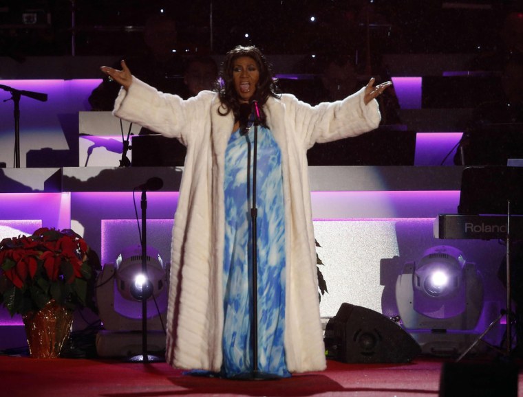 Singer Aretha Franklin performs at the National Christmas Tree lighting ceremony attended by President Barack Obama across from the White House in Was...