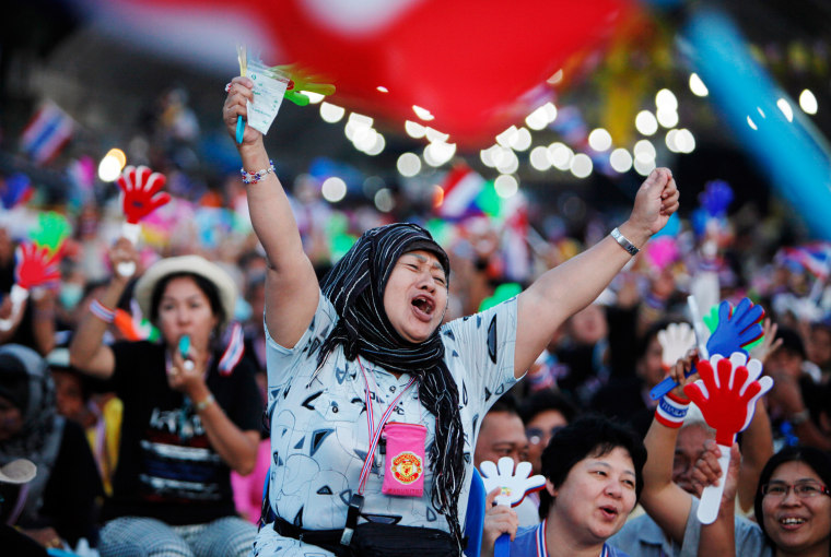 An anti-government protester chants at a rally at the Democracy Monument in Bangkok, Thailand, Sunday, Dec. 8, 2013. er)