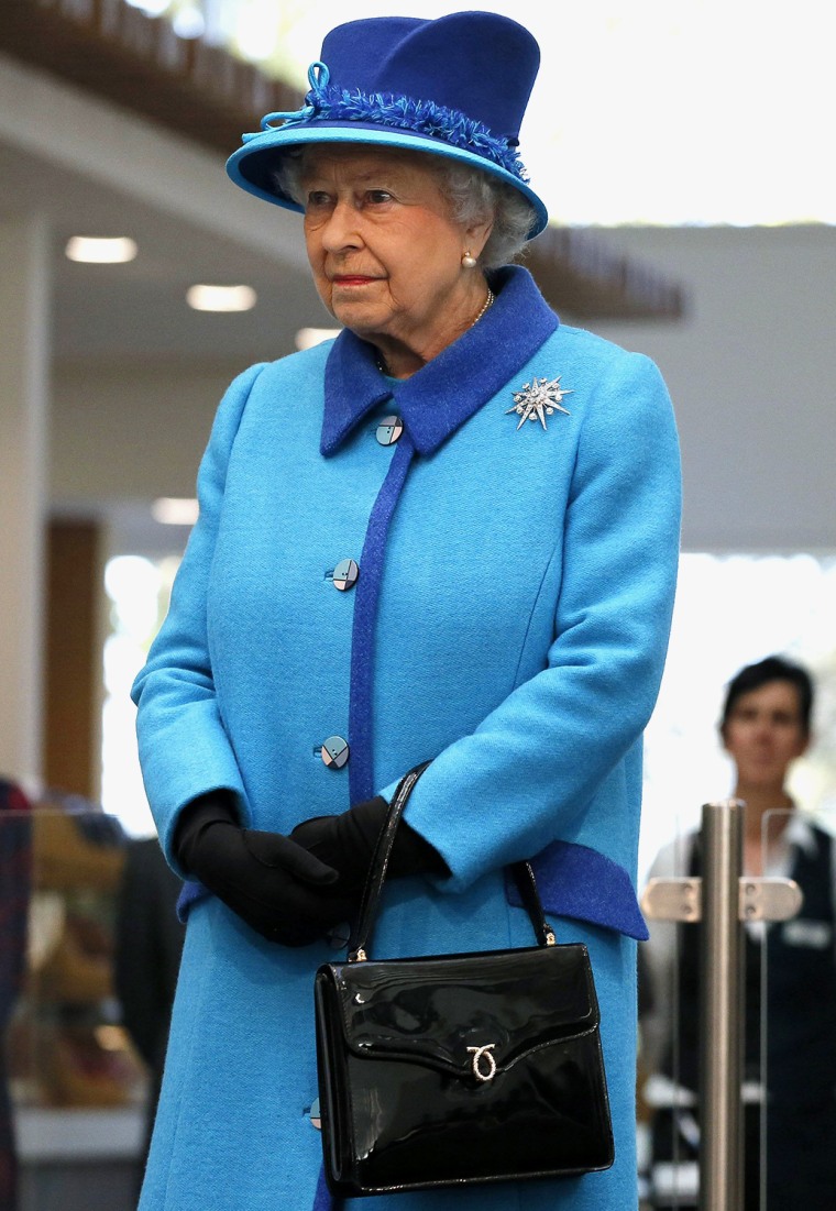 MANCHESTER, ENGLAND - NOVEMBER 14: Queen Elizabeth II and Prince Philip, Duke of Edinburgh after unveiling a plaque during their visit to the new head...