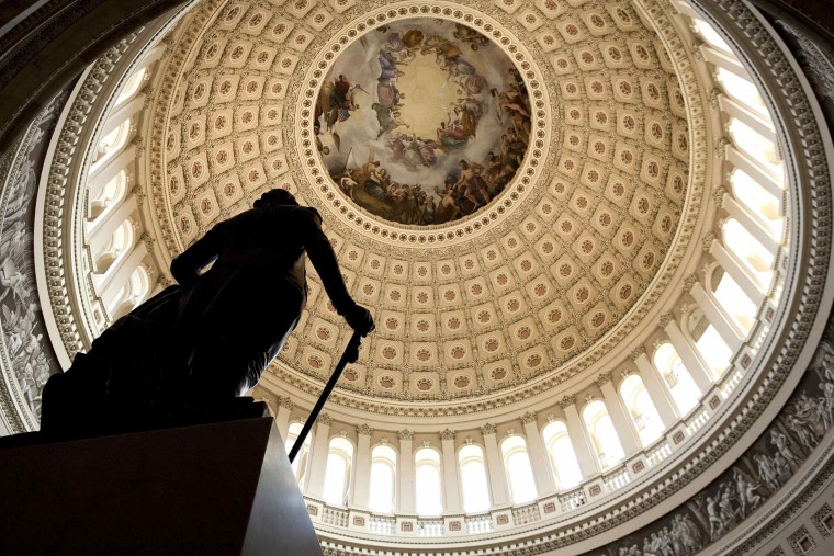 A statue stands in the Capitol Rotunda on Capitol Hill in Washington in this July 31, 2011 file photo.