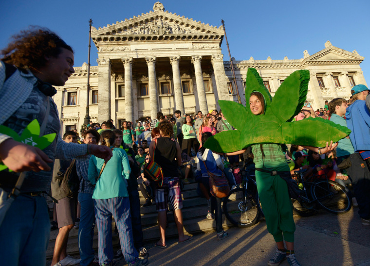 People attend a demonstration in support of the legalization of marijuana outside the Congress in Montevideo, Uruguay, on Tuesday.