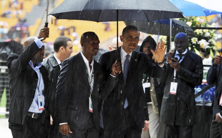 President Barak Obama attends Nelson Mandela's public memorial in Johannesburg, South Africa.