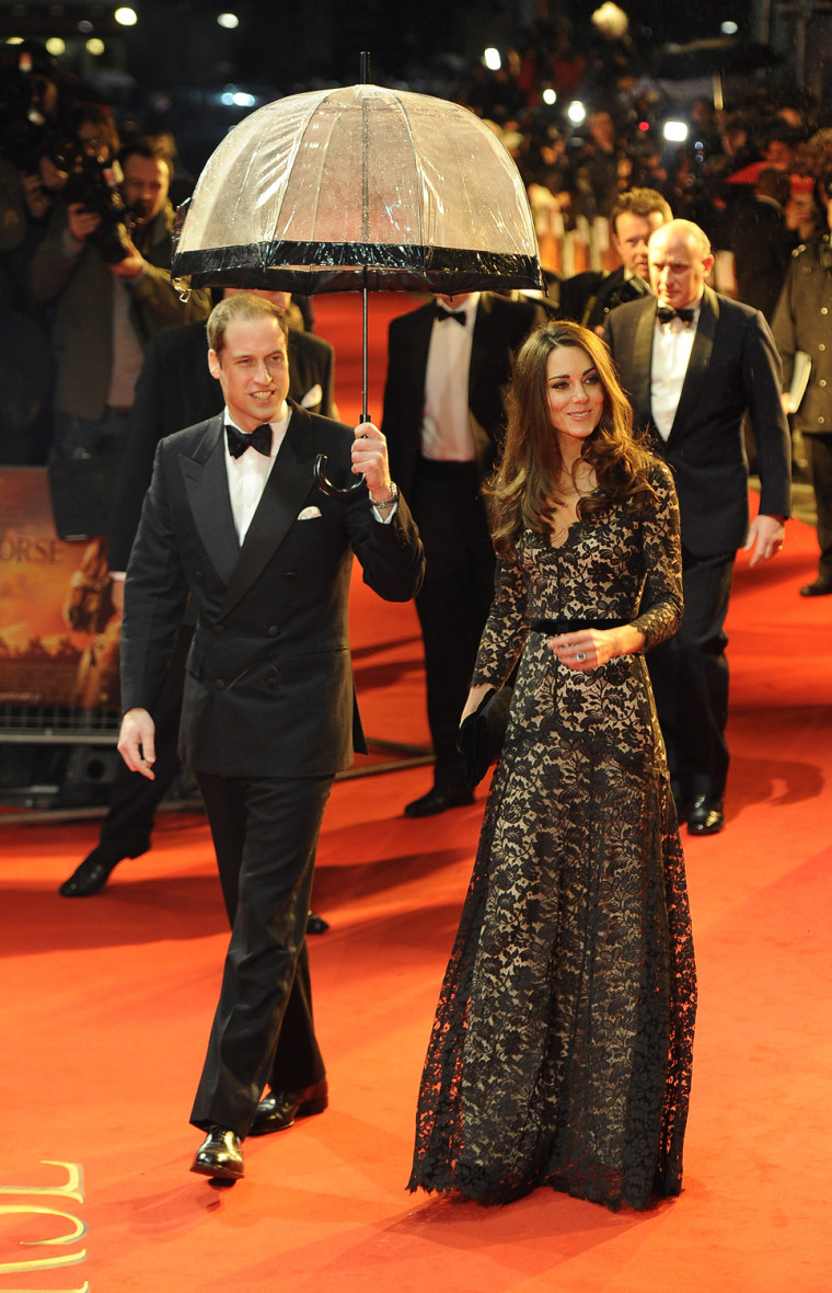 Britain's Prince William (L) arrives with Catherine, Duchess of Cambridge to the UK premiere of the film 'War Horse' in London January 8, 2012. REUTER...