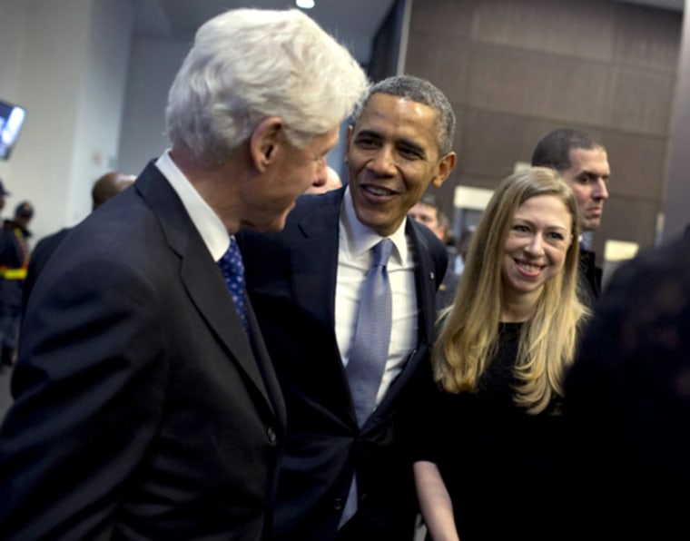 President Obama bids farewell to former President Bill Clinton and his daughter Chelsea.