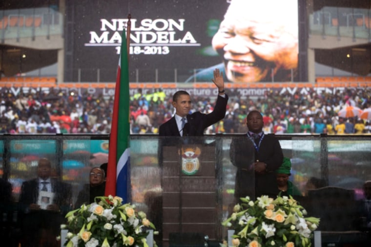 President Obama speaks at the memorial service for Nelson Mandela in Soweto, South Africa, Dec. 10, 2013.