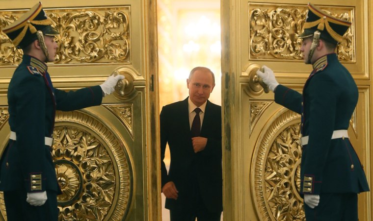 Russian President Vladimir Putin arrives to deliver his state-of-the-nation address in the Kremlin in Moscow on Thursday.