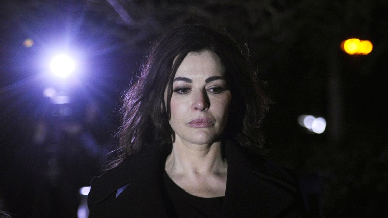 British journalist, broadcaster, and television chef Nigella Lawson leaves Isleworth Crown Court in London on Dec. 5.