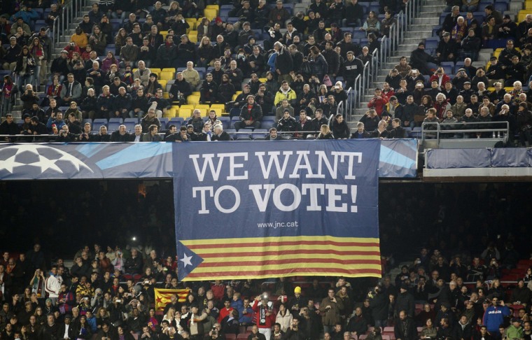 Supporters show a banner during a Champions League soccer match between Barcelona and Celtic at Camp Nou stadium, in Barcelona, Dec. 11, 2013.